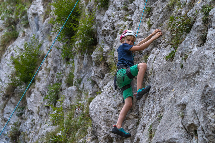 Discover the Adventure: Your Ultimate Guide to Camp Montana in Switzerland 4 Families preparing for the journey to Camp Montana, packing bags and checking transportation options